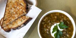 The shop offers take-home meals,soups and chicken broth (above). 