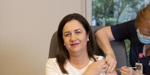 Queensland Premier Annastacia Palaszczuk is given the COVID-19 vaccination by clinical nurse Dawn Pedder at the Surgical Treatment Rehabilitation Service Centre in Brisbane.