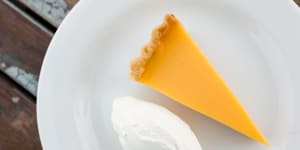 Zingy tang with crisp pastry:Lemon tart with fresh cream. 