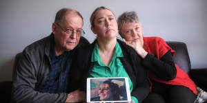 From Left:Lindsay,Vaness and Anne Byrnes with a photo of their daughter and sister,Rachael.