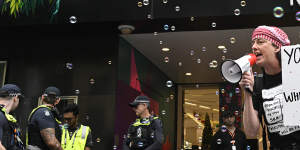 Pro-Palestine protesters gatecrash opening of Myer Christmas windows