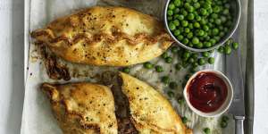 Serve these Cornish pasties with peas and tomato sauce.