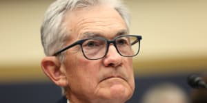 Jerome Powell listens to a question from a member of the House Financial Services Committee.