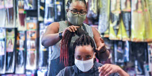 Chop,trim and a chat:hairdressers keep migrant communities woven together