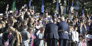 The two leaders greet visitors at the White House during the ceremonial welcome.