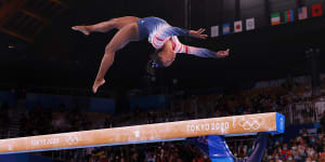 Simone Biles in action during the women’s balance beam final in Tokyo.
