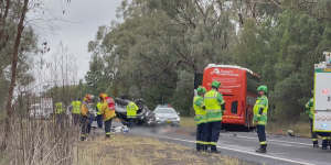 A sedan driver was killed and many bus passengers were injured after the car and the bus collided near Dubbo.