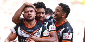 Winger David Nofoaluma (left) tops Wests Tigers’ all-time try-scoring list with 100.