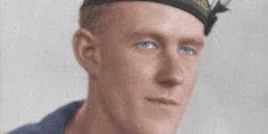 A colourised studio portrait of Able Seaman Thomas Welsby Clark when he was an Ordinary Seaman on HMAS St Giles. 