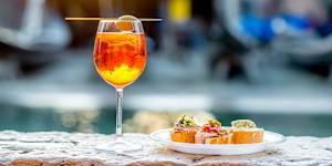 Aperol spritz on the canal in Venice.