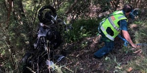 Rider falls five metres down embankment after motorbikes and car crash