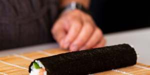 Step-by-step sushi rolls. Step 5. Once the sushi roll is rolled up inside the bamboo mat,press it together firmly with both hands to neaten,then gently remove the bamboo mat. Pic credit:Nagi Maehashi For Good Food,April 26,2022