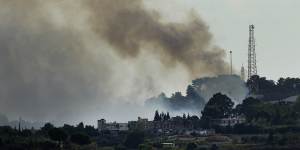Smoke rises from an Israeli army position which was attacked by Hezbollah fighters near Alma al-Shaab a Lebanese border village with Israel.
