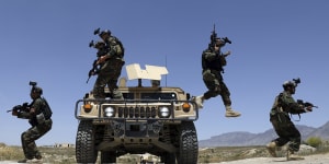 Afghan soldiers patrol outside their military base on the outskirts of Kabul,Afghanistan,last month. By September11 the remaining U.S.and allied NATO forces will leave the country,ending nearly 20 years of military engagement. 