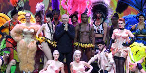 Jean Paul Gaultier with the cast of his revue at Paris’s Folies Bergère. “I would pick girls I saw in clubs in London and Paris,” he says.