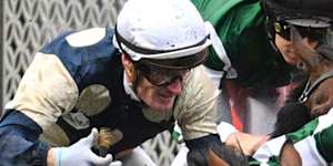 Melbourne Cup hopeful Buckaroo,left,runs a narrow second in the Cox Plate.