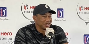 Tiger Woods at his first press conference since his car crash in February.
