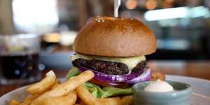 To make the beef burger,the patty is rubbed with coffee grounds before cooking,giving it bright smokiness. 