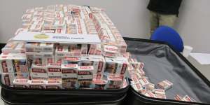 A suitcase full of cigarette packets seized as part of Operation Silverchalice.