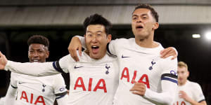 Son Heung-Min and Tottenham teammates celebrate a goal.