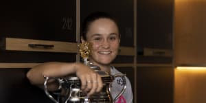 MELBOURNE,AUSTRALIA - JANUARY 29:In this handout image provided by Tennis Australia,Ashleigh Barty of Australia poses with the Daphne Akhurst Memorial Cup in the locker room after winning her Women’s Singles Final match against Danielle Collins of United States during day 13 of the 2022 Australian Open at Melbourne Park on January 29,2022 in Melbourne,Australia. (Photo by Fiona Hamilton/Tennis Australia via Getty Images)