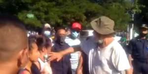 ormer East Timorese president and prime minister Xanana Gusmao slaps a mourner at least three times outside a COVID isolation facility in Dili yesterday. 