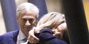 Julian Assange and his father,John Shipton,reunite at the airport.