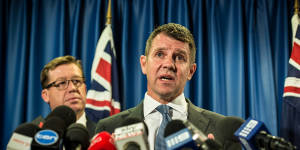 Mike Baird and Deputy Premier Troy Grant announce the greyhound racing reprieve on Tuesday.