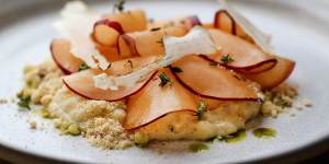 Rice pudding with jerusalem artichoke and peach petals.