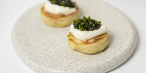 Caviar and creme fraiche on crumpets.
