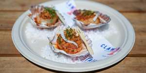 Scallops with spicy ’nduja and pine nut crumb.