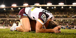 Reece Walsh slumps to the ground after Brisbane’s epic win.