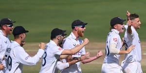 England celebrate during their stunning first Test win in India.