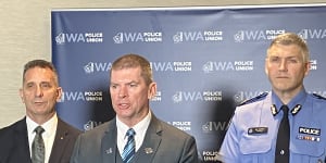 WA Police Union president Paul Gale (centre).