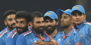 India celebrate Mohammed Shami’s seven-wicket heroics in the World Cup semi-final victory over New Zealand.