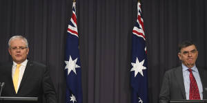 Prime Minister Scott Morrison and Chief Medical Officer Brendan Murphy speak to the media on Tuesday night