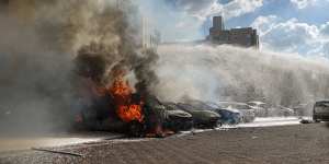 A blaze following a rocket attack from Gaza in Ashkelon on October 7.