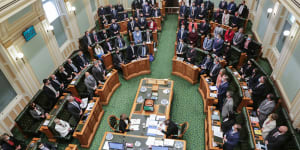 Queensland MPs standing to indicate their vote in favour of the Palaszczuk government’s voluntary assisted dying bill at the end of its second reading debate on Thursday,16 September,2021.