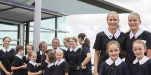 Eight sets of twin girls at St Margaret's Anglican College students. At front is Ruby and Olivia Howard (Year 11) with Agatha and Harriet George (Year 3);while at the rear are Paige Carrigan,Holly Carrigan,Ella Willersdorf,Charlotte Willersdorf,Jazmin Goudge,Jemma Goudge,Samantha Pinter,Madeleine Pinter,Ashleigh Carrick,Emily Carrick,Lucy and Emily Brown. 