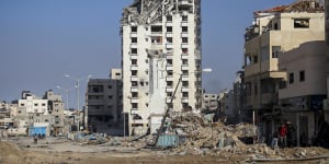 Destroyed buildings in Gaza City:The war between Israel and Hamas is threatening to become a broader conflict weighing on the world economy.