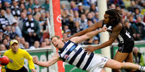 Heritier Lumumba (right),then Harry O’Brien,playing for Collingwood in the 2011 grand final.