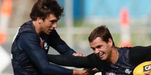 Carlton’s Brodie Kemp is tackled by teammate Caleb Marchbank (right) at training earlier in the year