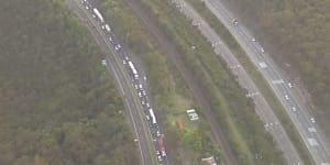 Road worker hit in'serious'crash on M1 in Sydney's north