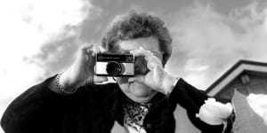 Irene Walsh with her Kodak Instamatic camera.