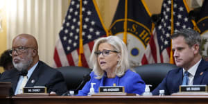 Republican Liz Cheney gives her opening remarks as Democrat Bennie Thompson,left,and Republican Adam Kinzinger look on,at the first public hearing of the House select committee investigating the US Capitol.