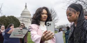 TikTok fans gather outside Congress as the House of Representatives votes to ban the social media platform unless it is divested by its Chinese owner.