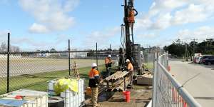 Transurban site investigators are seen drilling on the proposed Western Distributor toll road in Yarraville.