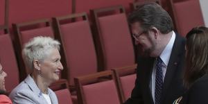 Derryn Hinch shakes hands with crossbench MPs Julia Banks and Kerryn Phelps in the Senate on Wednesday.