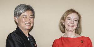 Foreign Minister Penny Wong with her UK counterpart and prime ministerial hopeful Liz Truss at the G20 in Indonesia.
