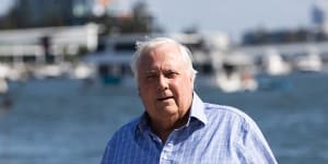 The Electoral Commission of Queensland has asked the Supreme Court to decide whether businessman Clive Palmer is a property developer and therefore banned from making political donations.